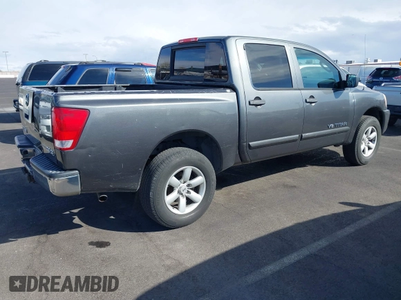 2010 Nissan Titan XE with VIN 1N6BA0EJ5AN304045, listed as a IAAI auction lot 41794718 with 297,551 mi miles. Bid and sale history available at carsss.com. Image 4.