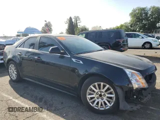 2012 Cadillac CTS Luxury with VIN 1G6DF5E56C0144953, listed as a Copart auction lot 51704895 with 123,099 mi miles and Salvage Title. Bid and sale history available at DreamBid. Image 4.