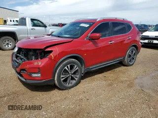 2017 Nissan Rogue SV z VIN JN8AT2MT2HW390012, wystawiony jako Copart lot #54553085 z przebiegiem 123 704 mil mil oraz Szkoda całkowita • Salvage title. Historia ofert i sprzedaży dostępna na DreamBid. Obrazek 1.