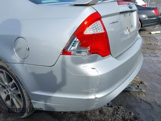 2010 Ford Fusion SEL with VIN 3FAHP0JA4AR179088, listed as a IAAI auction lot 41668231 with 188,265 mi miles. Bid and sale history available at carsss.com. Image 6.
