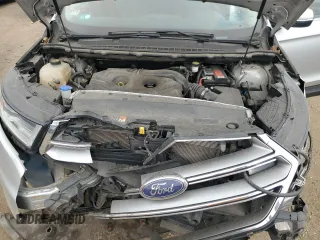 2015 Ford Edge Titanium z VIN 2FMTK4K9XFBB56155, wystawiony jako Copart lot #56735555 z przebiegiem 86 167 mil mil oraz Szkoda całkowita • Salvage title. Historia ofert i sprzedaży dostępna na DreamBid. Obrazek 11.