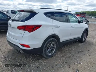 2018 Hyundai Santa Fe 2.4L z VIN 5NMZUDLB1JH101842, wystawiony jako IAAI lot #42302237 z przebiegiem 97 376 mil mil oraz . Historia ofert i sprzedaży dostępna na DreamBid. Obrazek 4.