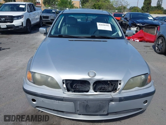2002 BMW 3 Series 325i with VIN WBAET37492NG83135, listed as a IAAI auction lot 42028502 with 184,216 mi miles. Bid and sale history available at carsss.com. Image 12.