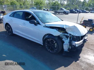 2023 Kia K5 GT-Line z VIN 5XXG64J28PG224307, wystawiony jako IAAI lot #42179602 z przebiegiem 28 635 mil mil oraz . Historia ofert i sprzedaży dostępna na DreamBid. Obrazek 1.