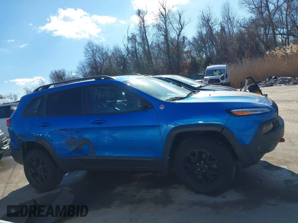 2018 Jeep Cherokee Trailhawk with VIN 1C4PJMBX7JD507453, listed as a IAAI auction lot 41464420 with 100,369 mi miles and . Bid and sale history available at DreamBid. Image 13.