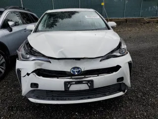 2022 Toyota Prius L Eco with VIN JTDKAMFUXN3173800, listed as a Copart auction lot 52438355 with 59,408 mi miles and Salvage Title. Bid and sale history available at carsss.com. Image 5.