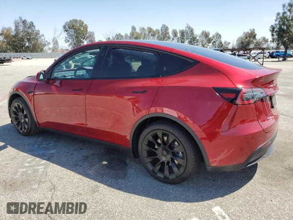 2024 Tesla Model Y Long Range with VIN 7SAYGAEE0RF016323, listed as a Copart auction lot 50253205 with 12,490 mi miles and Salvage title. Bid and sale history available at DreamBid. Image 2.