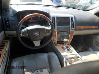 2008 Cadillac STS RWD z VIN 1G6DZ67A880189536, wystawiony jako Copart lot #71026144 z przebiegiem 178 958 mil mil oraz Szkoda całkowita • Salvage title. Historia ofert i sprzedaży dostępna na DreamBid. Obrazek 8.