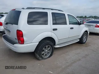 2004 Dodge Durango Limited with VIN 1D4HD58D34F211338, listed as a IAAI auction lot 42754684 with 230,021 mi miles and . Bid and sale history available at DreamBid. Image 4.
