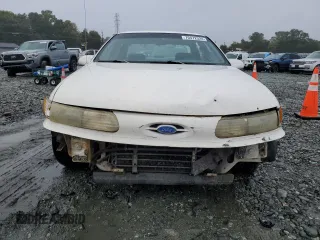 1994 Ford Taurus GL z VIN 1FALP52U5RA152732, wystawiony jako Copart lot #70472324 z przebiegiem 52 781 mil mil oraz Szkoda całkowita • Salvage title. Historia ofert i sprzedaży dostępna na DreamBid. Obrazek 5.
