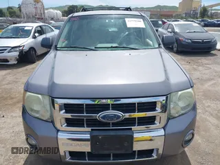 2008 Ford Escape XLT with VIN 1FMCU93128KA42482, listed as a IAAI auction lot 41979106 with 292,130 mi miles. Bid and sale history available at carsss.com. Image 6.