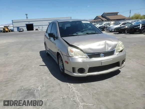 2006 Suzuki Aerio Premium z VIN JS2RA62S165300427, wystawiony jako Copart lot #57363605 z przebiegiem 141 824 mil mil oraz Szkoda całkowita • Salvage title. Historia ofert i sprzedaży dostępna na DreamBid. Obrazek 13.