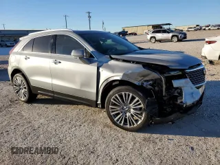 2024 Cadillac XT4 FWD Premium Luxury with VIN 1GYFZCR47RF213944, listed as a Copart auction lot 87674675 with 1,606 mi miles and Salvage title. Bid and sale history available at DreamBid. Image 4.