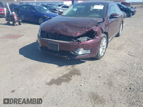 2013 Volkswagen Passat SEL Premium z VIN 1VWCP7A39DC052321, wystawiony jako IAAI lot #41694214 z przebiegiem 151 931 mil mil oraz . Historia ofert i sprzedaży dostępna na DreamBid. Obrazek 6.
