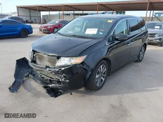 2016 Honda Odyssey Touring Elite with VIN 5FNRL5H95GB045915, listed as a IAAI auction lot 41869980 with 160,270 mi miles. Bid and sale history available at carsss.com. Image 2.