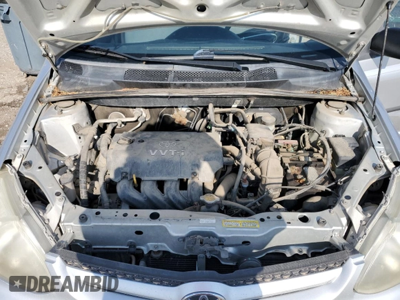 2004 Toyota ECHO z VIN JTDBT123740344511, wystawiony jako Copart lot #59365215 z przebiegiem 199 584 mil mil oraz Szkoda całkowita • Salvage title. Historia ofert i sprzedaży dostępna na DreamBid. Obrazek 11.