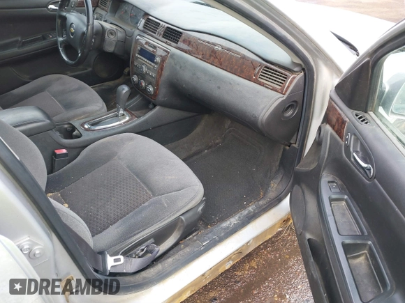 2013 Chevrolet Impala LS with VIN 2G1WF5E31D1154096, listed as a IAAI auction lot 41649749 with 204,860 mi miles and . Bid and sale history available at DreamBid. Image 5.