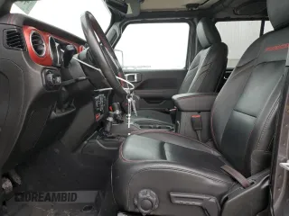 2023 Jeep Wrangler Rubicon with VIN 1C4HJXFN6PW509741, listed as a Copart auction lot 46056775 with 21,755 mi miles and Salvage title. Bid and sale history available at DreamBid. Image 7.
