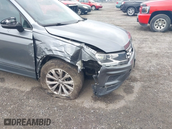2019 Volkswagen Tiguan S with VIN 3VV0B7AX1KM046808, listed as a IAAI auction lot 41911225 with 62,972 mi miles and . Bid and sale history available at DreamBid. Image 6.