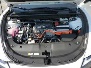 2023 Lexus RZ 450e Premium z VIN JTJAAAAB7PA020545, wystawiony jako Copart lot #66806794 z przebiegiem 7177 mil mil oraz Szkody całkowita. Historia ofert i sprzedaży dostępna na DreamBid. Obrazek 14.