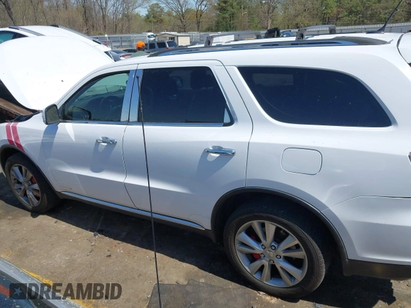 2013 Dodge Durango Crew with VIN 1C4RDHDG8DC698668, listed as a IAAI auction lot 41876841 with 160,012 mi miles and . Bid and sale history available at DreamBid. Image 14.