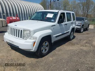 2012 Jeep Liberty Sport z VIN 1C4PJMAK7CW209305, wystawiony jako IAAI lot #42105378 z przebiegiem 136 617 mil mil oraz . Historia ofert i sprzedaży dostępna na DreamBid. Obrazek 2.