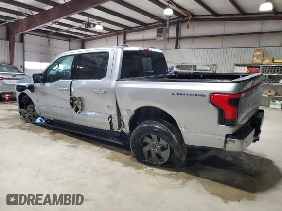2024 Ford F-150 Lightning Lariat z VIN 1FT6W5L74RWG04451, wystawiony jako Copart lot #86058664 z przebiegiem 2 232 mil mil oraz Szkoda całkowita • Salvage title. Historia ofert i sprzedaży dostępna na DreamBid. Obrazek 2.