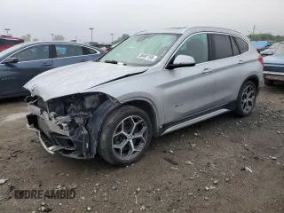 2016 BMW X1 xDrive28i z VIN WBXHT3C39GP881884, wystawiony jako Copart lot #58497155 z przebiegiem 90 536 mil mil oraz Szkoda całkowita • Salvage title. Historia ofert i sprzedaży dostępna na DreamBid. Obrazek 1.