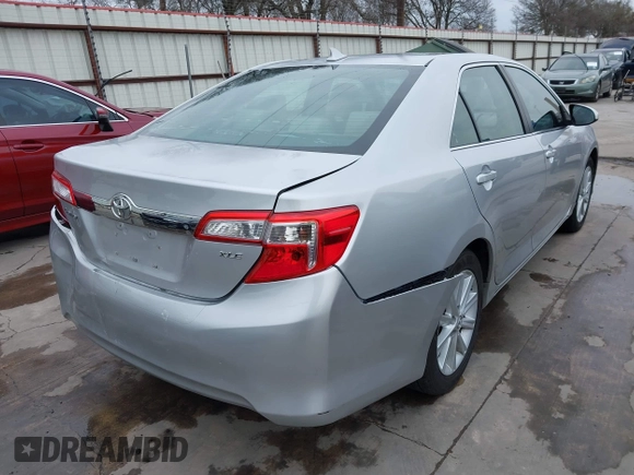 2014 Toyota Camry SE with VIN 4T1BK1FK7EU540975, listed as a IAAI auction lot 41673926 with 190,036 mi miles. Bid and sale history available at carsss.com. Image 4.