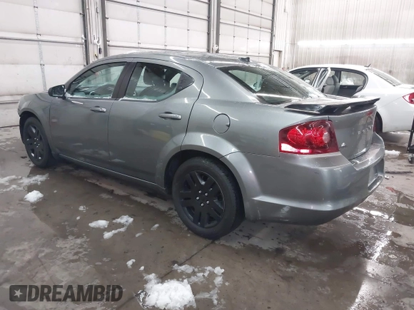 2013 Dodge Avenger SE with VIN 1C3CDZAB1DN581303, listed as a IAAI auction lot 41942469 with 123,330 mi miles. Bid and sale history available at carsss.com. Image 3.