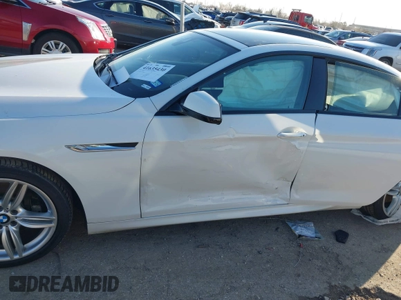 2015 BMW 6 Series 640i xDrive with VIN WBA6B8C50FD453317, listed as a IAAI auction lot 41635430 with 77,811 mi miles and . Bid and sale history available at DreamBid. Image 6.