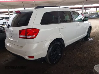 2019 Dodge Journey SE with VIN 3C4PDCBB7KT797842, listed as a IAAI auction lot 42036147 with 163,919 mi miles and . Bid and sale history available at DreamBid. Image 4.
