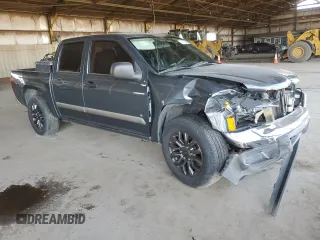 2007 GMC Canyon SLE1 with VIN 1GTCS13E978201623, listed as a Copart auction lot 74133524 with 149,547 mi miles and Salvage Title. Bid and sale history available at carsss.com. Image 4.