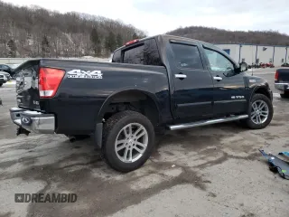 2015 Nissan Titan Pro-4X with VIN 1N6AA0EC2FN501632, listed as a Copart auction lot 84063524 with 92,342 mi miles and Salvage title. Bid and sale history available at DreamBid. Image 3.