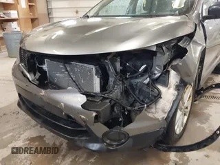 2017 Nissan Rogue SL z VIN JN1BJ1CR9HW128710, wystawiony jako IAAI lot #42307830 z przebiegiem 129 791 mil mil oraz . Historia ofert i sprzedaży dostępna na DreamBid. Obrazek 6.