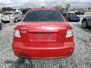 2012 Suzuki SX4 LE with VIN JS2YC5A39C6300577, listed as a Copart auction lot 86998944 with 103,354 mi miles and Non Repairable. Bid and sale history available at carsss.com. Image 6.