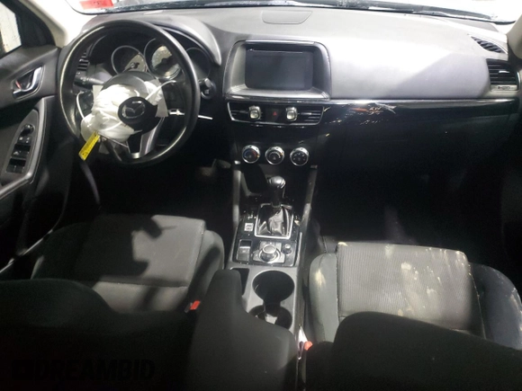 2016 Mazda CX-5 Sport z VIN JM3KE4BY0G0768549, wystawiony jako Copart lot #49923445 z przebiegiem 130 236 mil mil oraz Szkoda całkowita • Salvage title. Historia ofert i sprzedaży dostępna na DreamBid. Obrazek 8.