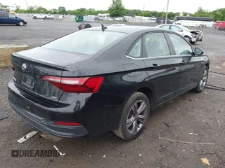 2023 Volkswagen Jetta SE with VIN 3VW7M7BUXPM038075, listed as a IAAI auction lot 42314234 with 19,490 mi miles and . Bid and sale history available at DreamBid. Image 4.