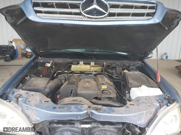 2005 Mercedes-Benz M-Class 3.7L with VIN 4JGAB57E25A560516, listed as a IAAI auction lot 41898369 with 125,927 mi miles. Bid and sale history available at carsss.com. Image 10.