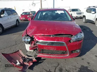 2015 Mitsubishi Lancer SE with VIN JA32V2FW7FU024779, listed as a IAAI auction lot 40681839 with Not Provided miles. Bid and sale history available at carsss.com. Image 12.