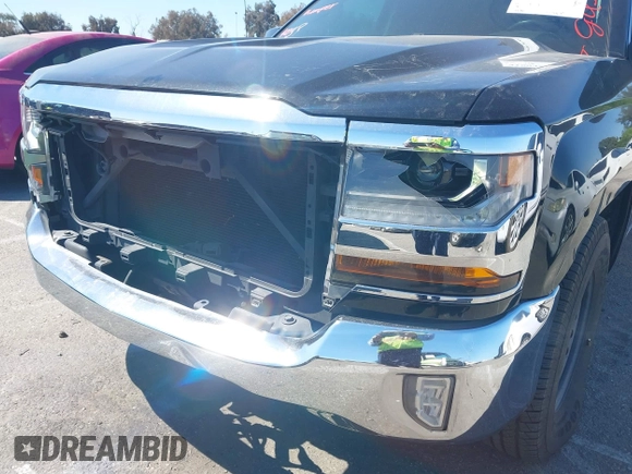 2016 Chevrolet Silverado 1500 LT with VIN 1GCRCREC0GZ246817, listed as a IAAI auction lot 41804303 with 39,198 mi miles and . Bid and sale history available at DreamBid. Image 6.