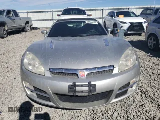 2007 Saturn Sky z VIN 1G8MB35B47Y101765, wystawiony jako Copart lot #68054344 z przebiegiem 82 064 mil mil oraz Szkody całkowita. Historia ofert i sprzedaży dostępna na DreamBid. Obrazek 5.