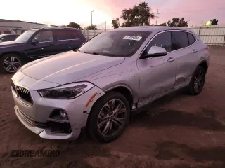 2020 BMW X2 sDrive28i with VIN WBXYH9C09L5P95698, listed as a Copart auction lot 87486094 with 45,319 mi miles and Salvage Title. Bid and sale history available at carsss.com. Image 1.