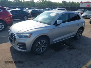 2021 Audi Q5 Premium with VIN WA1AAAFY4M2004691, listed as a IAAI auction lot 42393635 with 17,802 mi miles and . Bid and sale history available at DreamBid. Image 2.