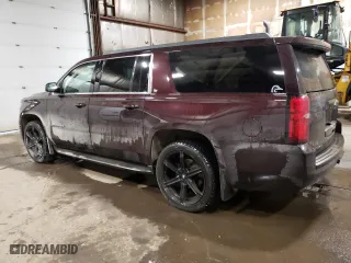 2020 Chevrolet Suburban LT with VIN 1GNSKHKC2LR210311, listed as a Copart auction lot 48062535 with 73,737 mi miles and Salvage Title. Bid and sale history available at carsss.com. Image 2.