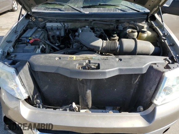 2004 Ford F-150 XLT z VIN 1FTRW12W64KA34323, wystawiony jako Copart lot #65196405 z przebiegiem 170 724 mil mil oraz Szkoda całkowita • Salvage title. Historia ofert i sprzedaży dostępna na DreamBid. Obrazek 11.