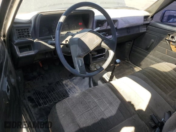 1987 Toyota Pickup with VIN JT4RN50R5H0228706, listed as a Copart auction lot 50639045 with 296,043 mi miles and Salvage Title. Bid and sale history available at DreamBid. Image 8.
