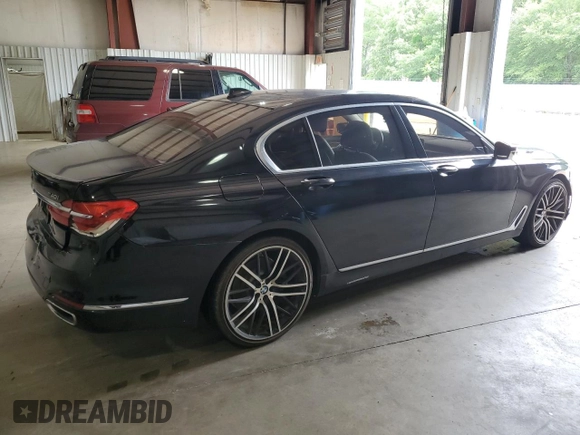 2017 BMW 7 Series 740i with VIN WBA7E2C36HG741125, listed as a Copart auction lot 55754185 with 90,305 mi miles and Clean Title. Bid and sale history available at DreamBid. Image 3.