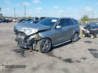 2013 Mercedes-Benz M ML 63 AMG with VIN 4JGDA7EB9DA155725, listed as a IAAI auction lot 41502675 with 64,849 mi miles. Bid and sale history available at carsss.com. Image 16.
