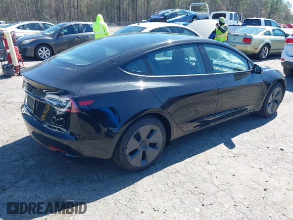 2022 Tesla Model 3 Long Range with VIN 5YJ3E1EB3NF104313, listed as a IAAI auction lot 41832803 with 39,061 mi miles and . Bid and sale history available at DreamBid. Image 4.